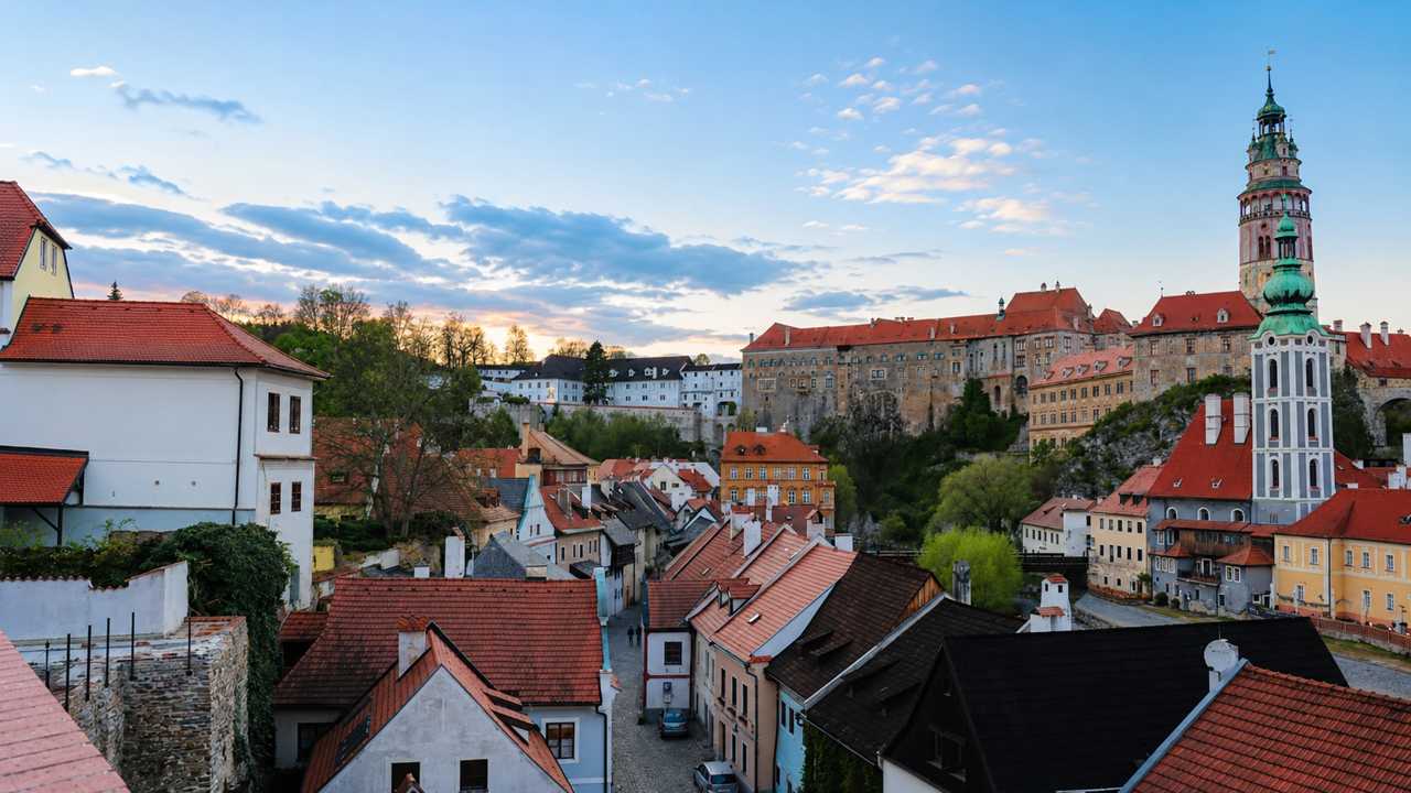 View over Český Krumlov rooftops and castle towers near Mini Hotel Abraka